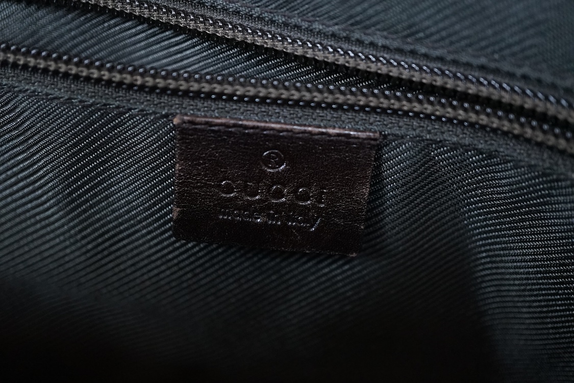 A Gucci supreme monogram travel case, 40cm wide